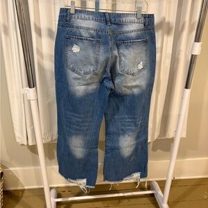 Women's Distressed Blue Jeans